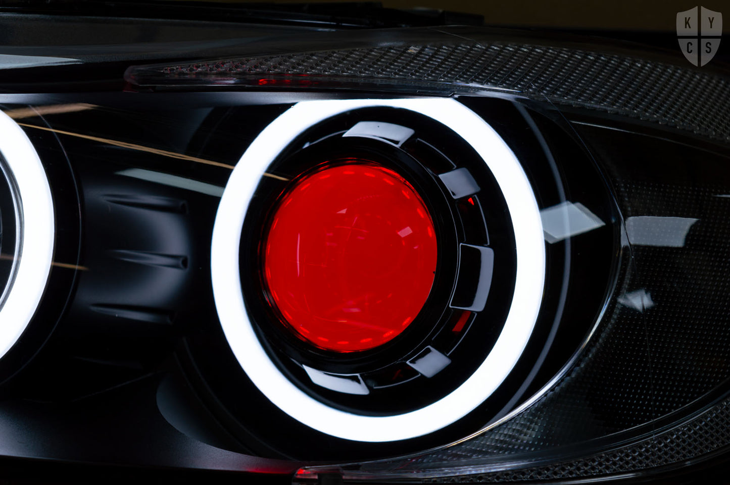 Headlight options on the above vehicle: KYCS (white) angel eyes | Modern blackout | Bi-LED 2.5" projector with LED bulb | Upgraded high beam (high beam LED unit array style) | Red demon eye | New headlight plastic lenses/covers | LED indicators