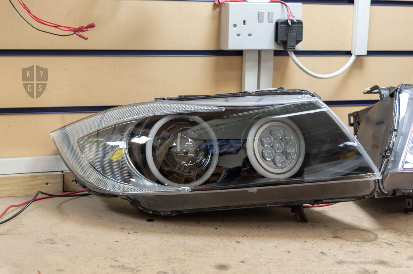 Headlight options on the above vehicle: KYCS (white) angel eyes | Modern blackout | Bi-LED 2.5" projector with LED bulb | Upgraded high beam (high beam LED unit array style) | Red demon eye | New headlight plastic lenses/covers | LED indicators