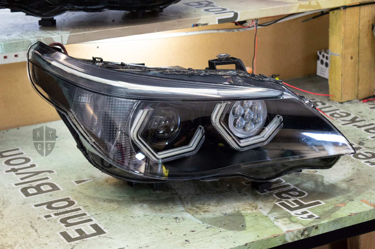 Headlight options on the above vehicle: BavGruppe Design (white) angel eyes | Classic blackout | Upgraded projectors (G5) | Etched lenses | Upgraded high beam (high beam LED unit array style) | Red demon eye | Upgraded eyebrow (switchback) | New headlight plastic lenses/covers