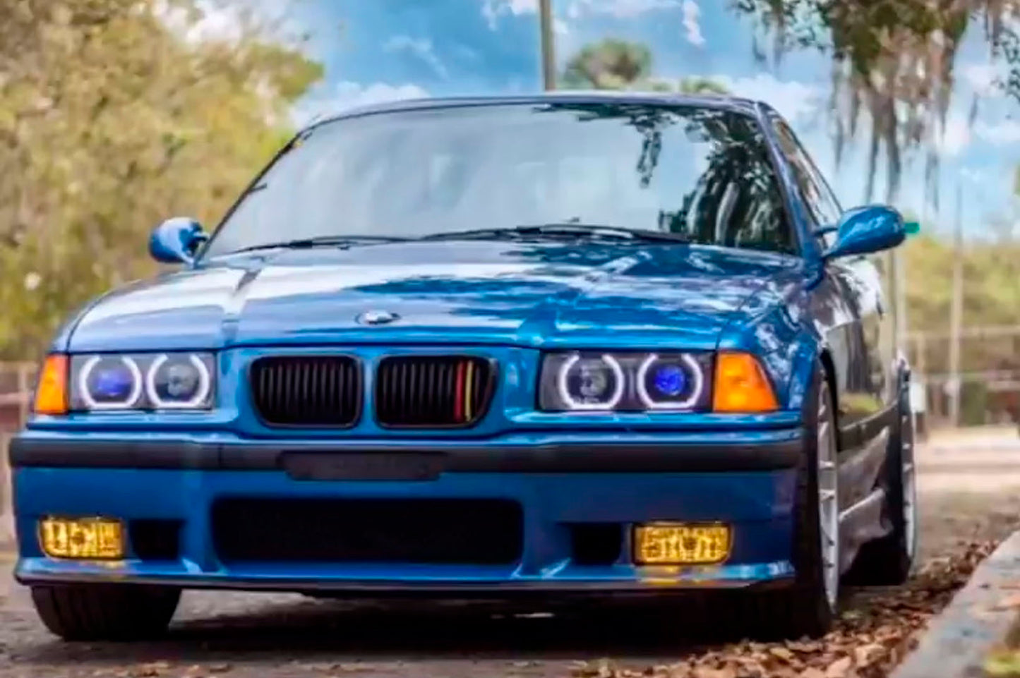 BMW 3 Series E36 (Halogen) Custom Headlights. Equipped With The Following Options: BavGruppe Design DTM Angel Eyes (White) | Blue Demon Eyes