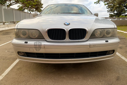 E39 pre refurbishment with aged lenses and worn clearcoat