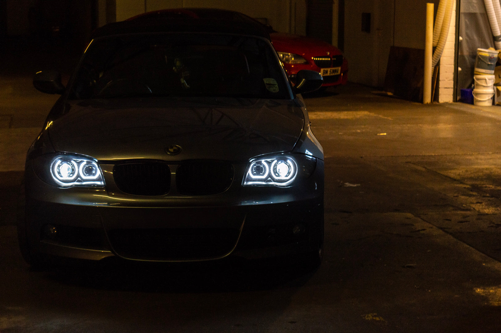 BMW 1 Series E87 & E81 E82 E88 (Pre LCI Halogen) Custom Headlights. Equipped With The Following Options: KYCS DTM Angel Eyes (White) | Bi-LED Projector