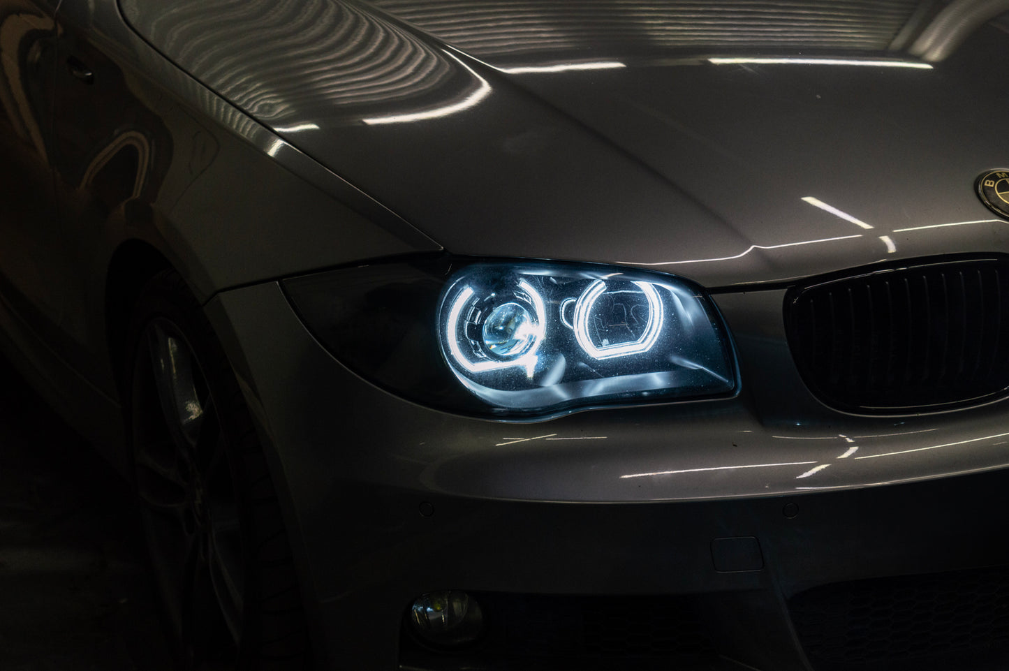 BMW 1 Series E87 & E81 E82 E88 (Pre LCI Halogen) Custom Headlights. Equipped With The Following Options: KYCS DTM Angel Eyes (White) | Bi-LED Projector