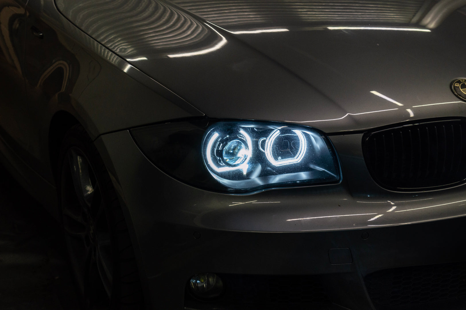 BMW 1 Series E87 & E81 E82 E88 (Pre LCI Halogen) Custom Headlights. Equipped With The Following Options: KYCS DTM Angel Eyes (White) | Bi-LED Projector