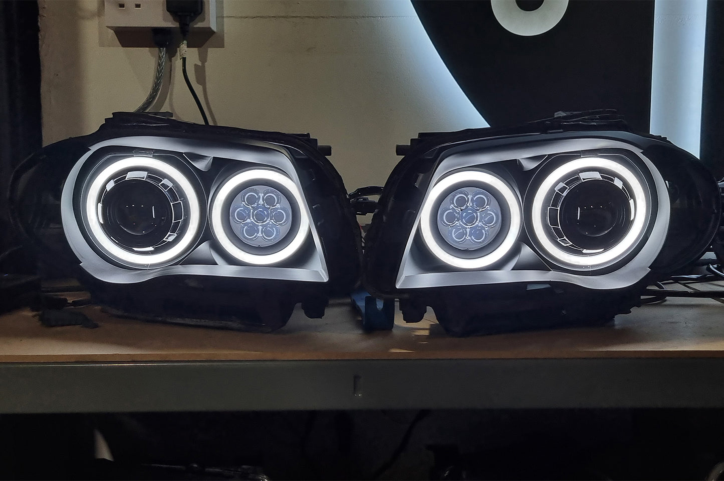 BMW 1 Series E87 & E81 E82 E88 (Pre LCI Halogen) Custom Headlights. Equipped With The Following Options: KYCS Round Angel Eyes (White) | Bi-LED Projector | LED High Beam Array