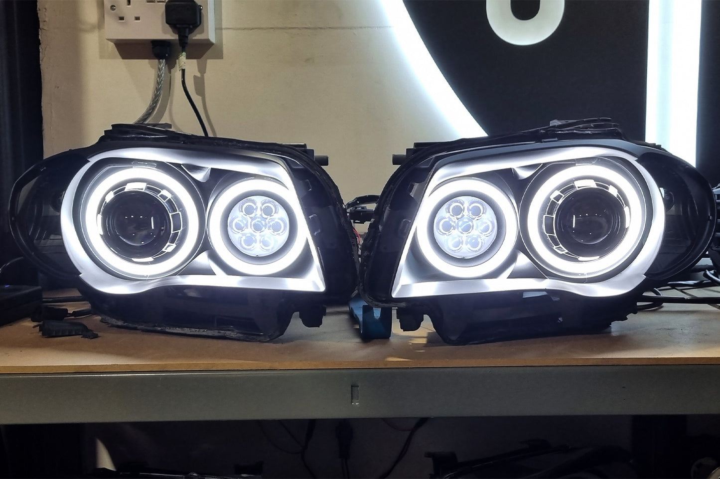 BMW 1 Series E87 & E81 E82 E88 (Pre LCI Halogen) Custom Headlights. Equipped With The Following Options: KYCS Round Angel Eyes (White) | Bi-LED Projector | LED High Beam Array