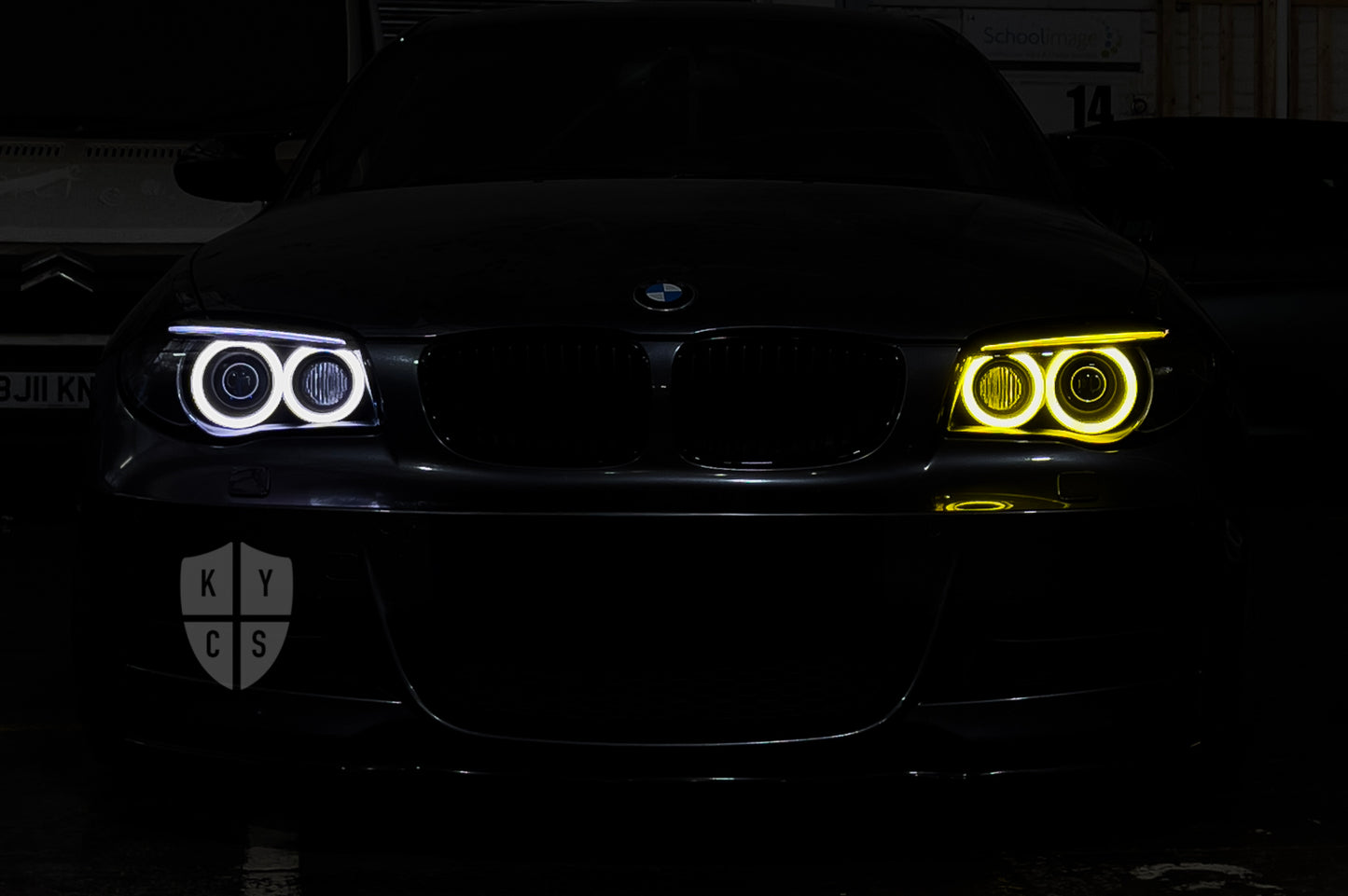BMW 1 Series E87 & E81 E82 E88 (Pre LCI Xenon/Adaptive Xenon) Custom Headlights. Equipped With The Following Options: BavGruppe Design Round Angel Eyes (Dual Colour - White & CSL Yellow) | BavGruppe Design Carbon Fibre Eyebrow With Optic & LED Strip (Dual Colour - White & CSL Yellow) | G5-BRT Projector & Brackets (Projector Upgrade) | New Headlight Lenses
