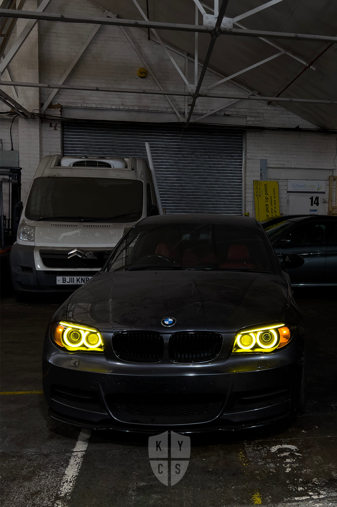 BMW 1 Series E87 & E81 E82 E88 (Pre LCI Xenon/Adaptive Xenon) Custom Headlights. Equipped With The Following Options: BavGruppe Design Round Angel Eyes (Dual Colour - White & CSL Yellow) | BavGruppe Design Carbon Fibre Eyebrow With Optic & LED Strip (Dual Colour - White & CSL Yellow) | G5-BRT Projector & Brackets (Projector Upgrade) | New Headlight Lenses
