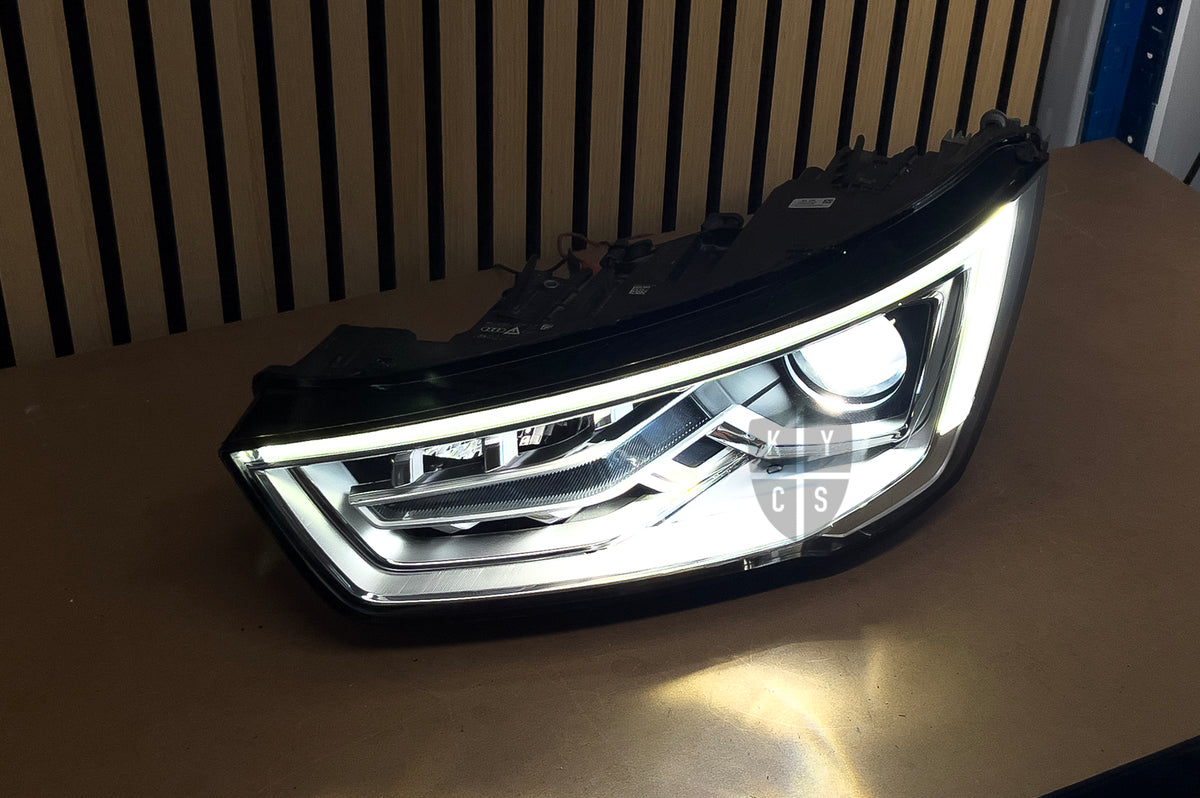 Audi A1 S1 8X LED headlight lit up after headlight lens replacement and headlight repair by KYCS