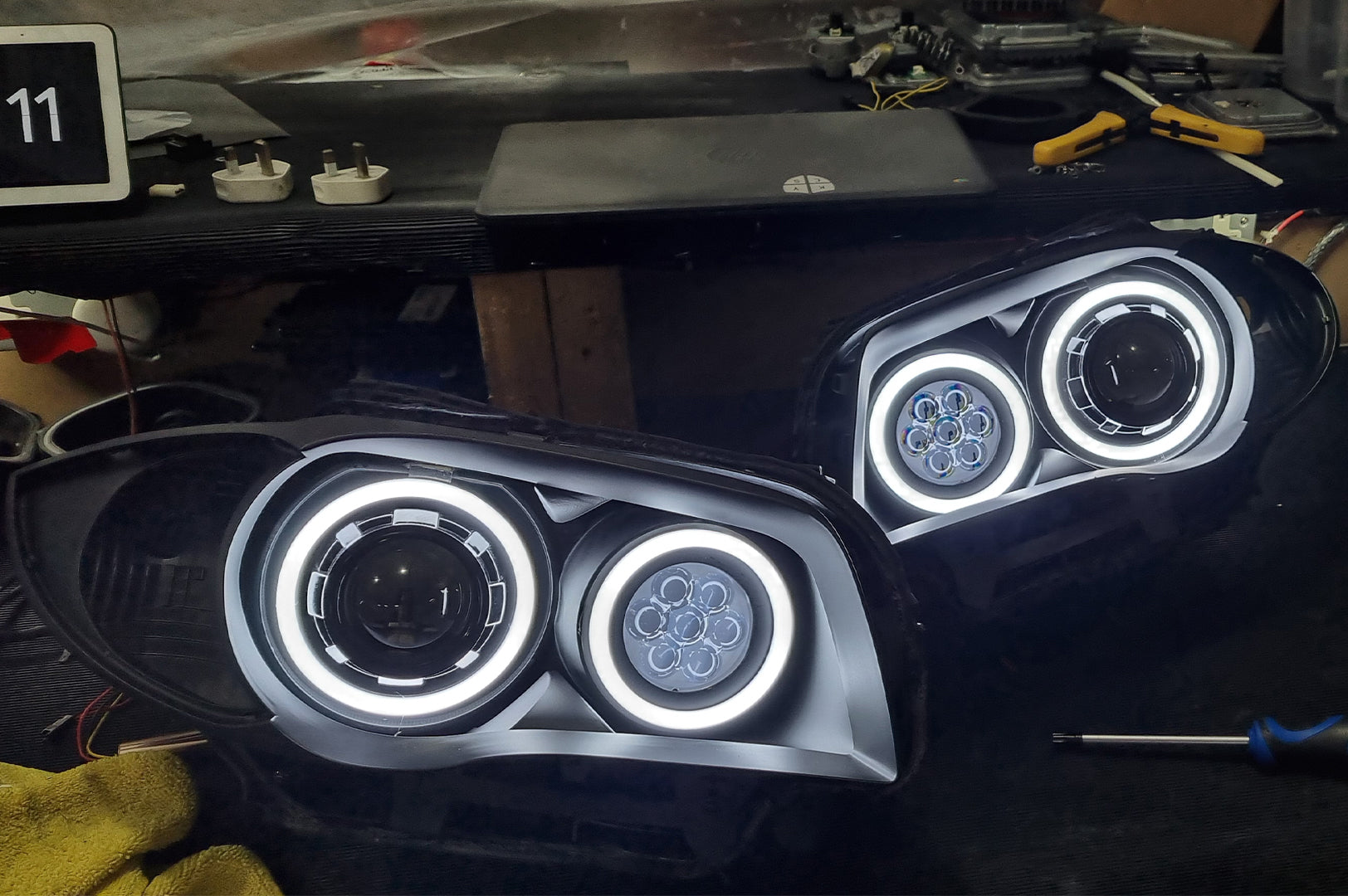 BMW 1 Series E87 & E81 E82 E88 (Pre LCI Halogen) Custom Headlights. Equipped With The Following Options: KYCS Round Angel Eyes (White) | Bi-LED Projector | LED High Beam Array