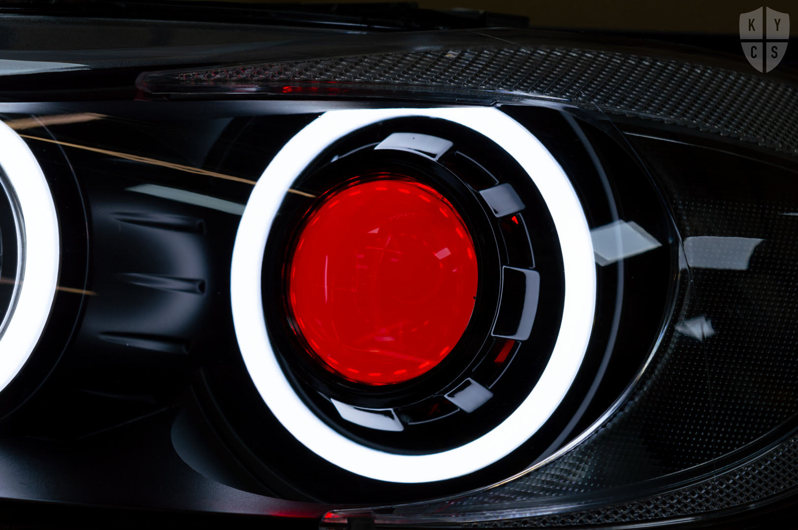 Headlight options on the above vehicle: KYCS (white) angel eyes | Modern blackout | Bi-LED 2.5" projector with LED bulb | Upgraded high beam (high beam LED unit array style) | Red demon eye | New headlight plastic lenses/covers | LED indicators