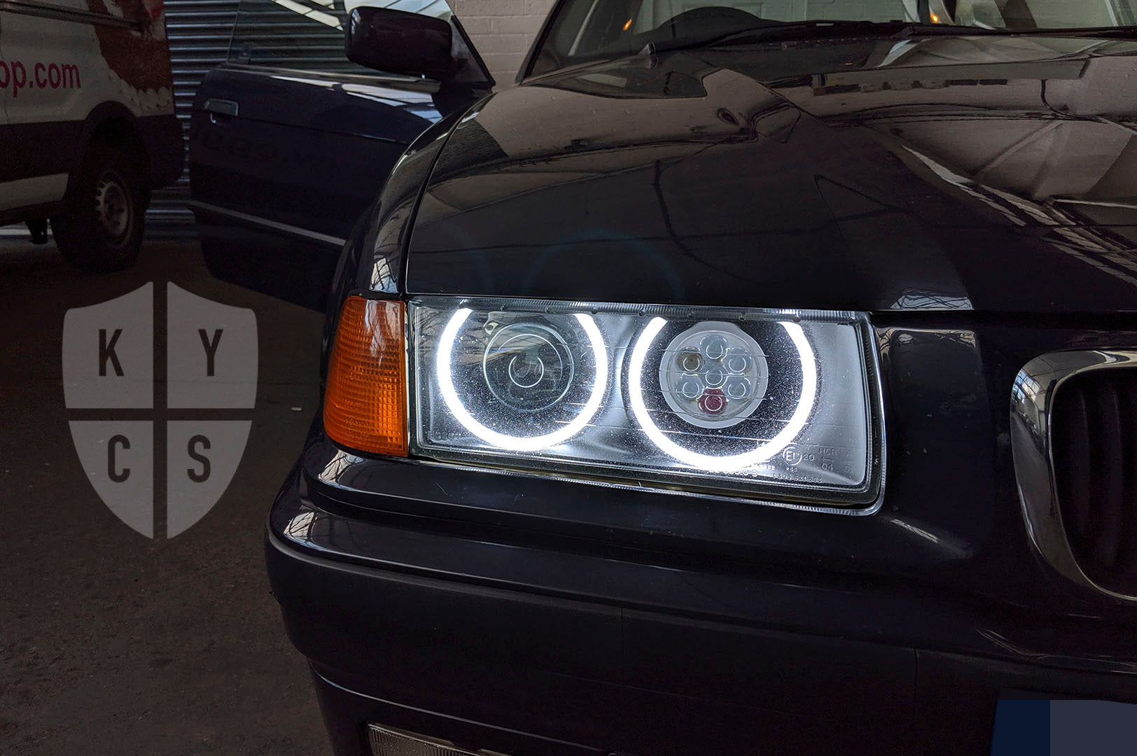 BMW 3 Series E36 (Halogen) Custom Headlights. Equipped With The Following Options: KYCS Full Circle Flat Top Angel Eyes (White) | G5 Upgraded Xenon Projector | LED High Beam Array