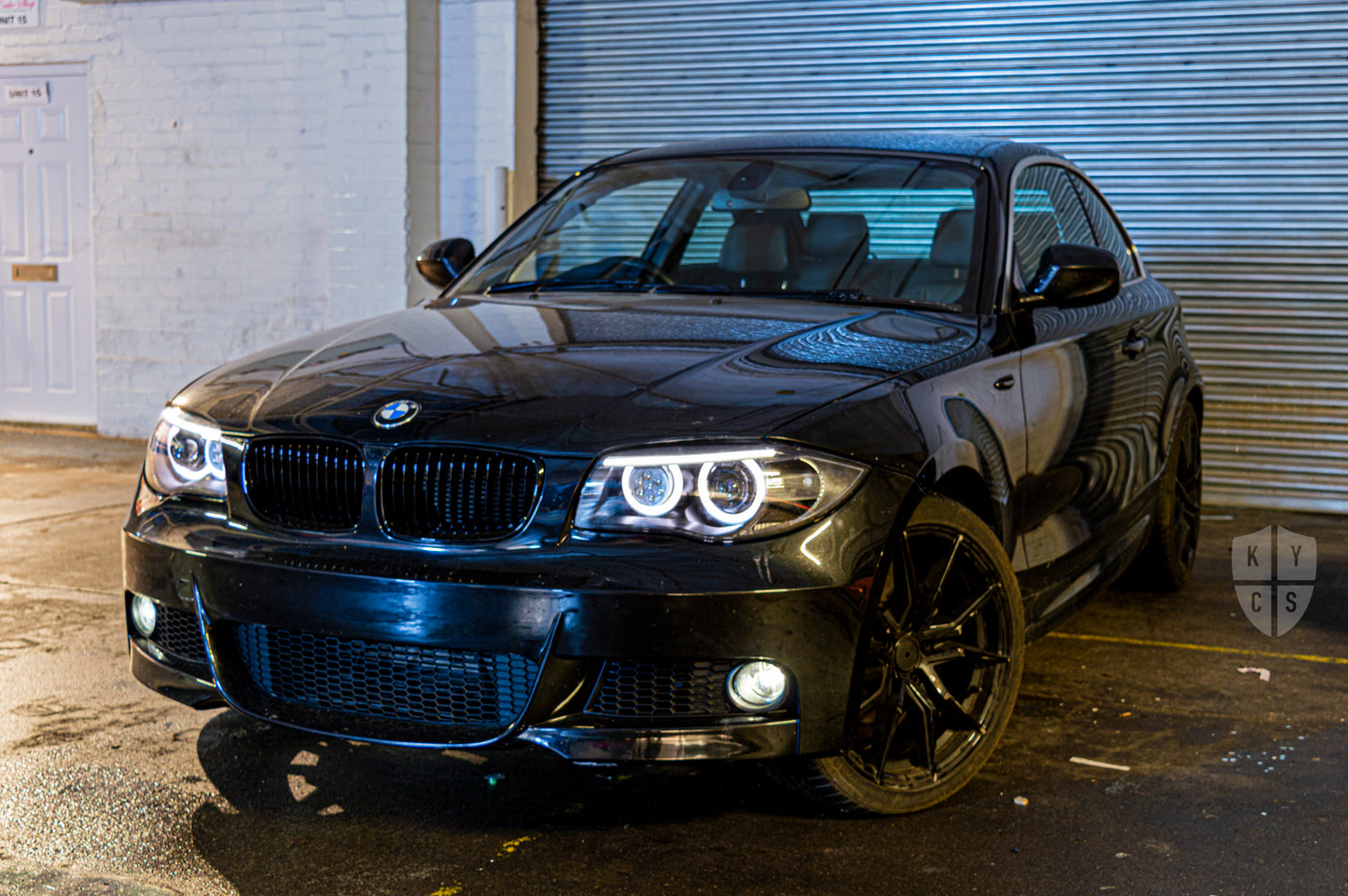 BMW 1 Series E81 E82 E88 (LCI Halogen) Custom Headlights. Equipped With The Following Options: BavGruppe Design Round Angel Eyes (White) | BavGruppe Design LED Strip Eyebrow Within OEM Opening (White) | Bi-LED Projector | LED High Beam Array | New Headlight Lenses