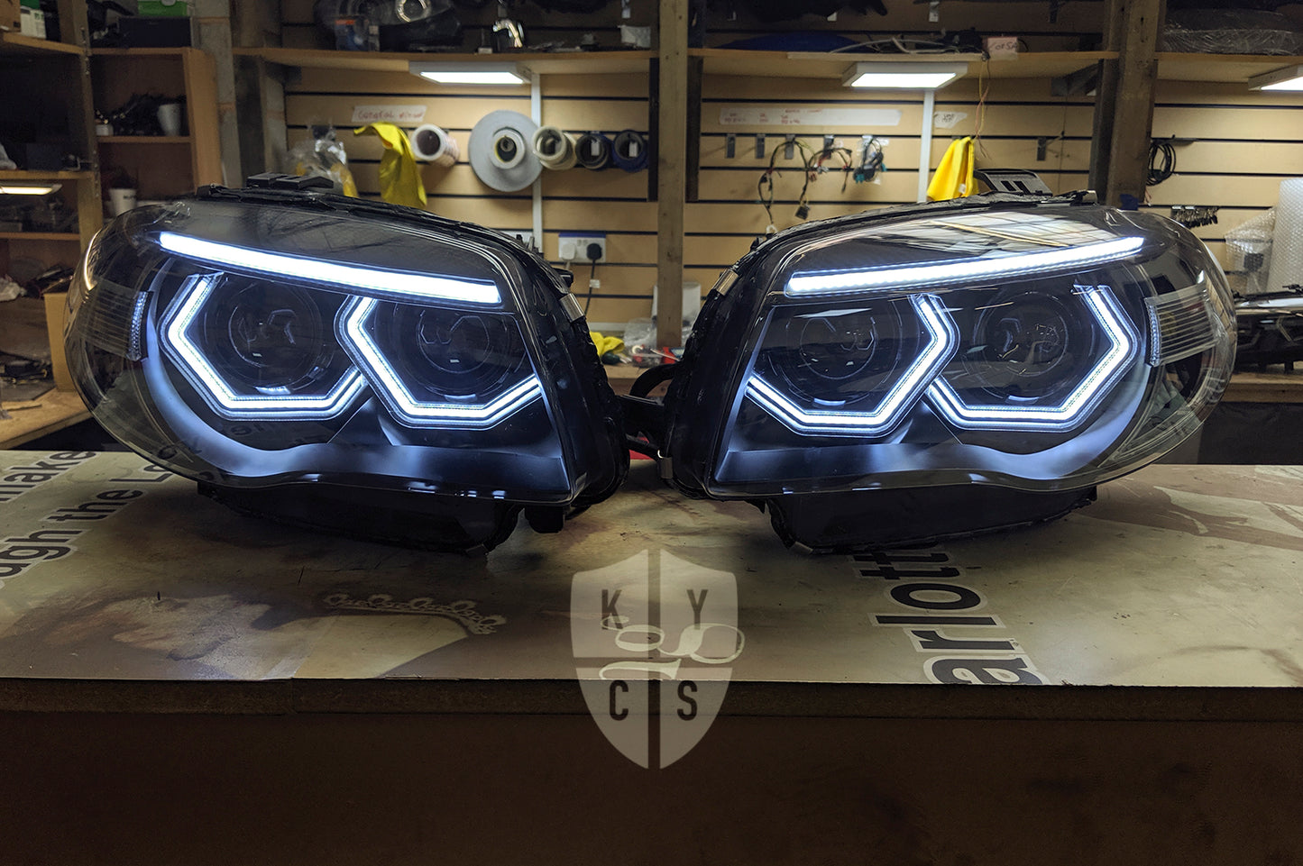 BMW 1 Series E81 E82 E88 (LCI Halogen) Custom Headlights. Equipped With The Following Options: BavGruppe Design Vision Angel Eyes (White) | BavGruppe Design LED Strip Eyebrow Within OEM Opening (White) | Bi-LED Projector | LED High Beam Projector | New Headlight Lenses