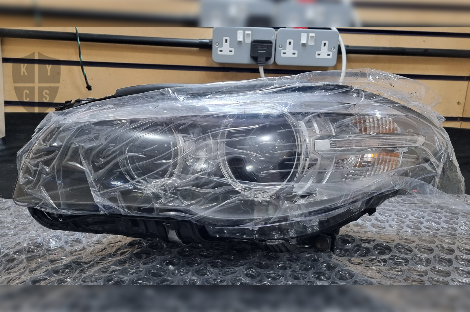 Replacement headlight outlet units