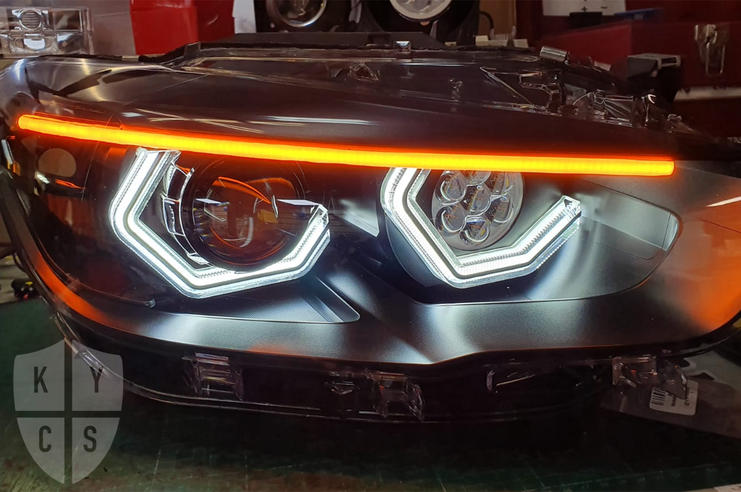BMW 1 Series F20 F21 (LCI Halogen) Custom Headlights. Equipped With The Following Options: BavGruppe Design Vision Angel Eyes (White) | BavGruppe Design Full Length LED Strip Eyebrow (Switchback) |Bi-LED Projector | LED High Beam Array | New Headlight Lenses