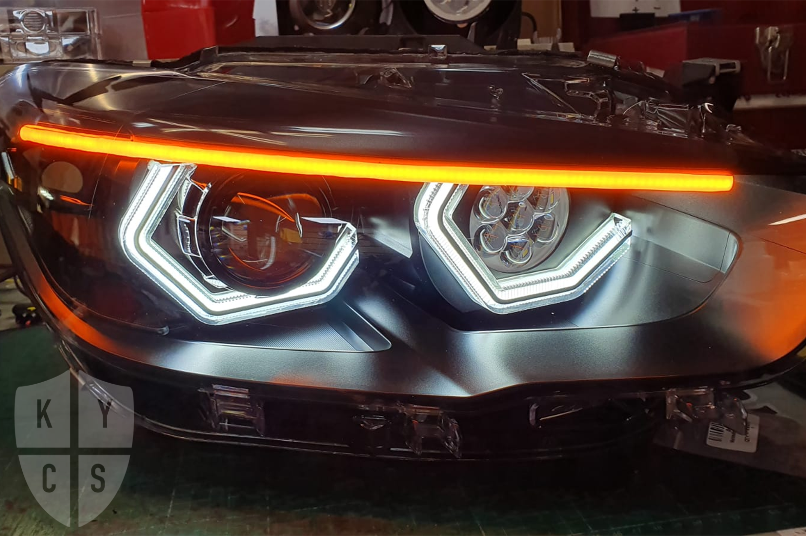 BMW 1 Series F20 F21 (LCI Halogen) Custom Headlights. Equipped With The Following Options: BavGruppe Design Vision Angel Eyes (White) | BavGruppe Design Full Length LED Strip Eyebrow (Switchback) |Bi-LED Projector | LED High Beam Array | New Headlight Lenses