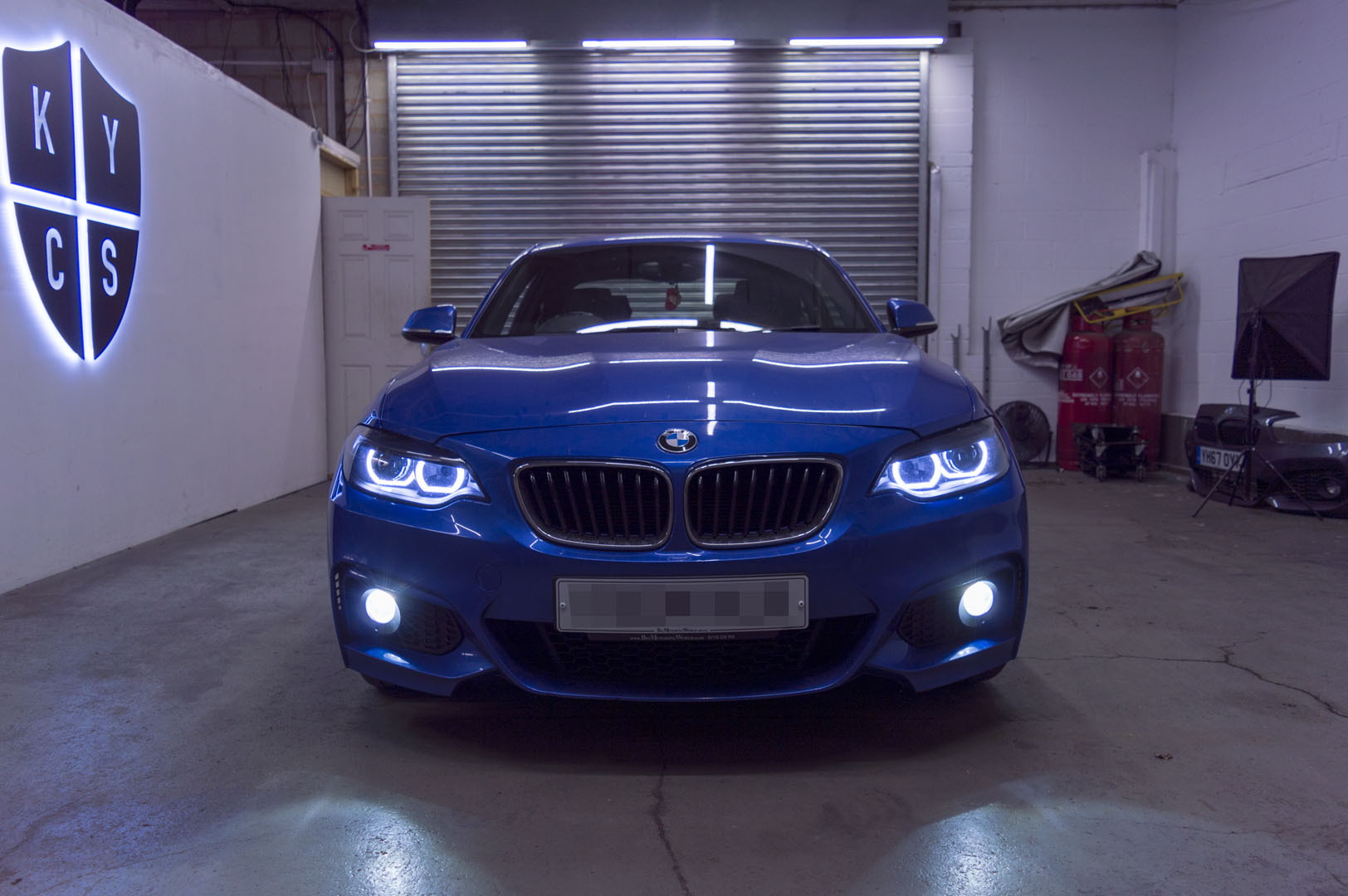 BMW 2 Series E87 & F22 F23 F87 (Pre LCI Halogen) Custom Headlights. Equipped With The Following Options: KYCS DTM Angel Eyes (White) | Bi-LED Projector