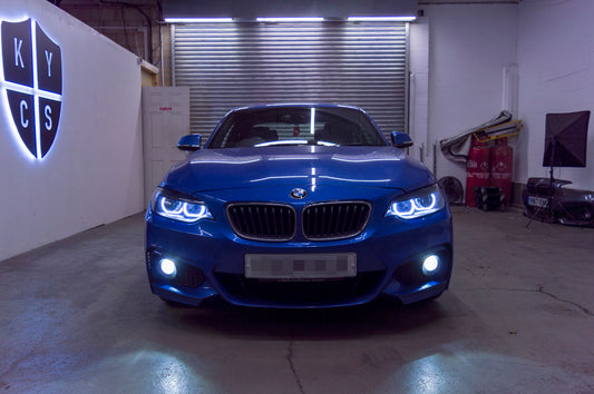 BMW 2 Series E87 & F22 F23 F87 (Pre LCI Halogen) Custom Headlights. Equipped With The Following Options: KYCS DTM Angel Eyes (White) | Bi-LED Projector