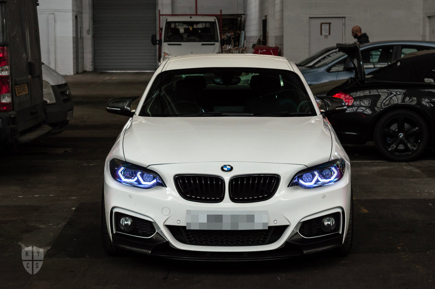 BMW 2 Series E87 & F22 F23 F87 (Pre LCI Halogen) Custom Headlights. Equipped With The Following Options: BavGruppe Design Vision Angel Eyes (White) | Bi-LED Projector | LED High Beam Array | New Lenses
