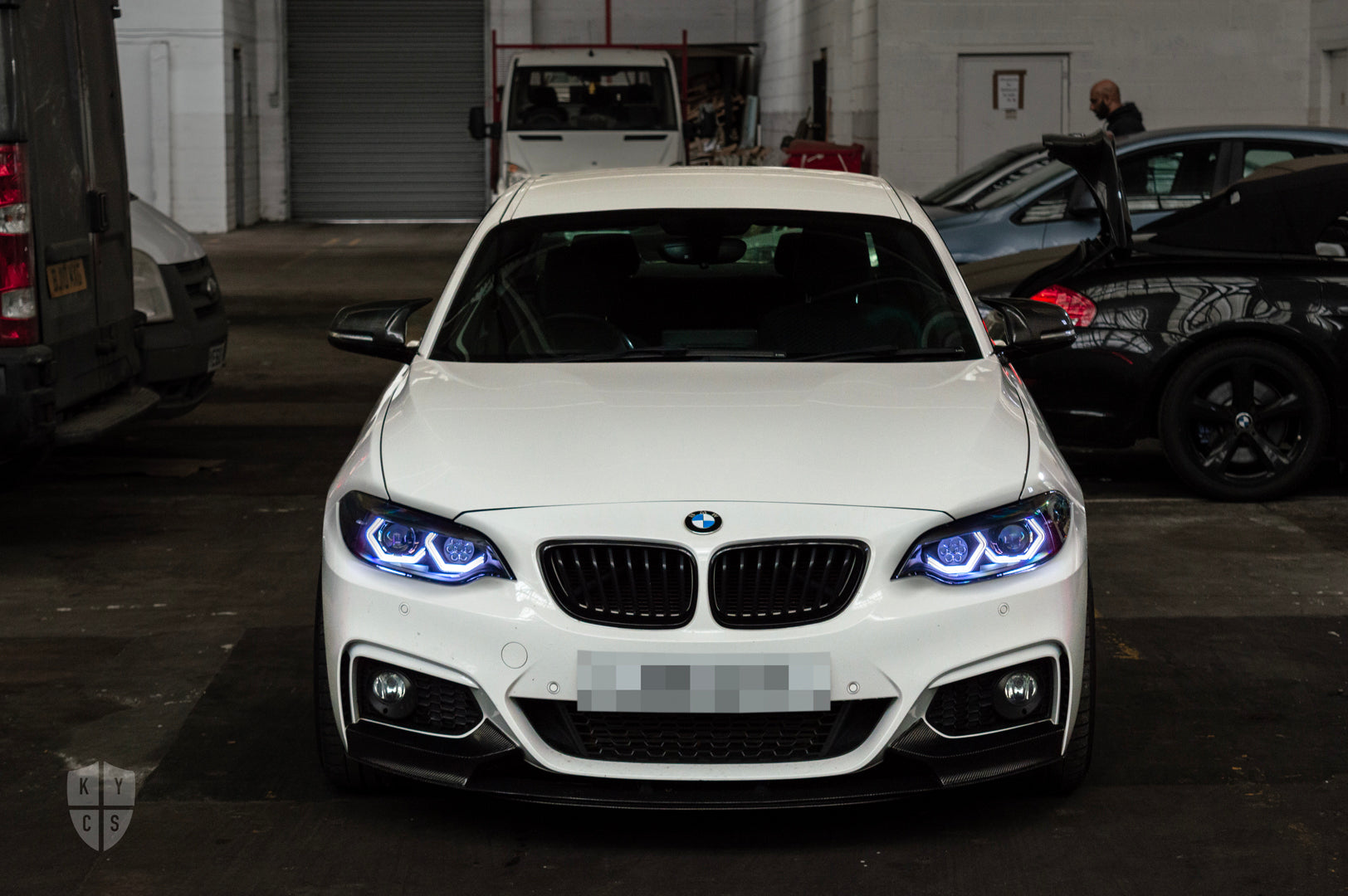 BMW 2 Series E87 & F22 F23 F87 (Pre LCI Halogen) Custom Headlights. Equipped With The Following Options: BavGruppe Design Vision Angel Eyes (White) | Bi-LED Projector | LED High Beam Array | New Lenses
