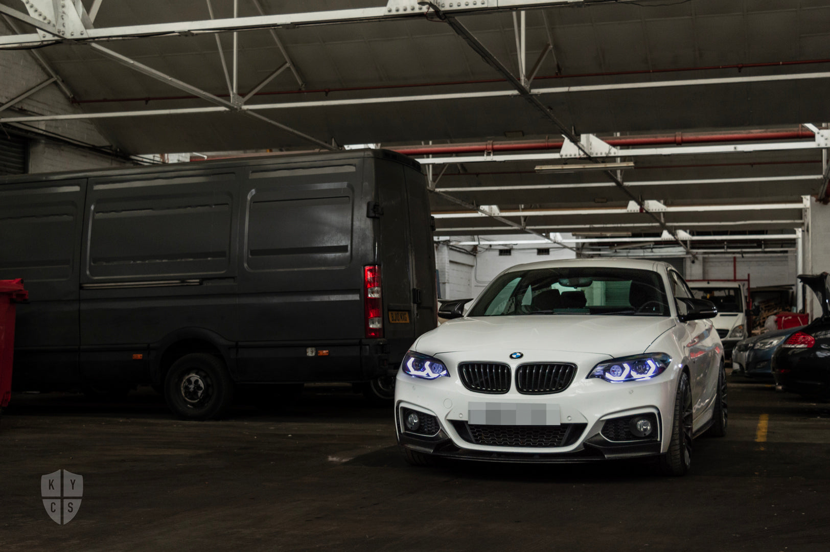 BMW 2 Series E87 & F22 F23 F87 (Pre LCI Halogen) Custom Headlights. Equipped With The Following Options: BavGruppe Design Vision Angel Eyes (White) | Bi-LED Projector | LED High Beam Array | New Lenses
